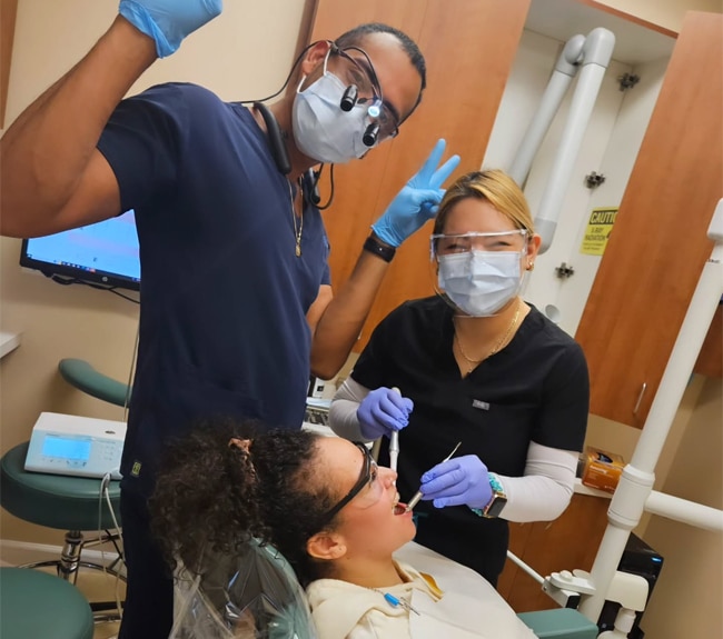 Dental team in Burbank providing patient care and treatment in modern practice setting.