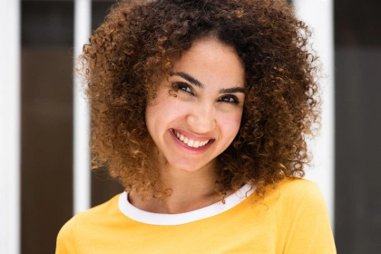 A smiling woman after Botox therapy in the location