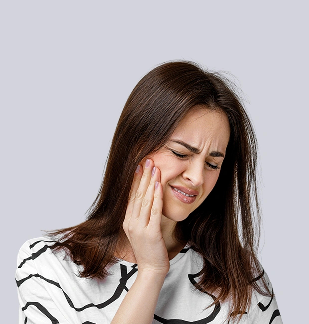 Girl receiving urgent dental care in Location